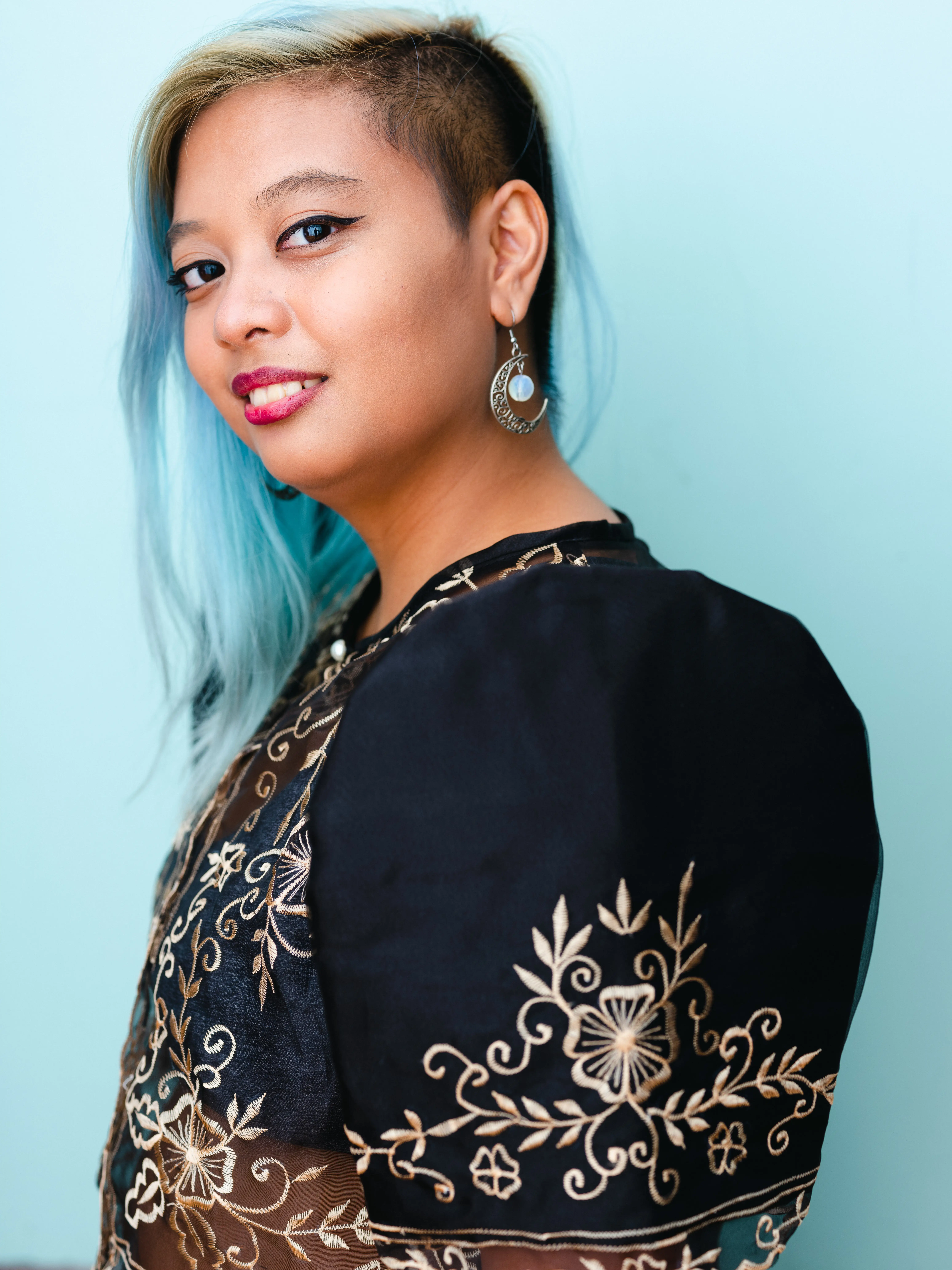 A headshot of Mars Juno Bartolome Neri, artist and stage manager.